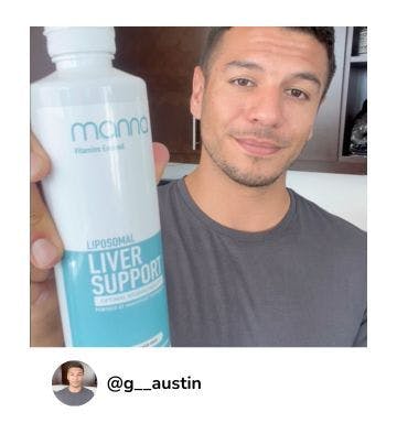 A manna customer holding up a bottle of Liposomal Liver Support 1